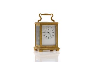 A brass striking carriage clock,