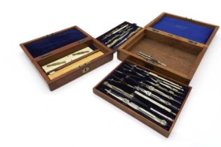 Two mahogany cased sets of drawing instrument