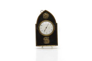 An arch shaped wall clock