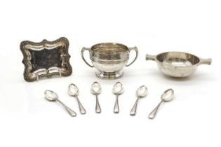 A group of silver items