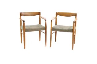 A pair of Danish teak armchairs,