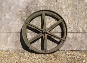 A cast iron cog, or drive wheel,