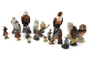 A collection of porcelain whiskey miniatures and birds