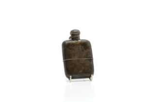 An Edwardian silver hip flask,