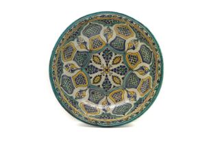 A large Iznik style pottery bowl,