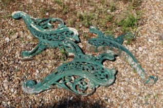 A set of cast iron bench supports,