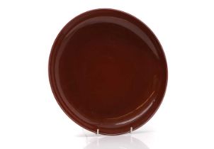 A Chinese red-glazed porcelain plate,