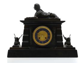 A Victorian Egyptian Revival black slate mantel clock