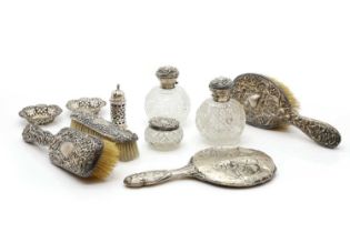 A collection of silver dressing table items