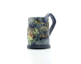 A Castle Hedingham pottery 'Castle' mug,