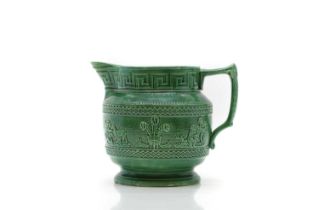 A Staffordshire pottery green glazed jug