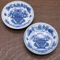 A pair of Chinese blue and white saucers,