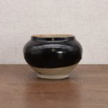 A Chinese black-glazed jar,