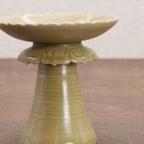 A Chinese celadon-glazed stem saucer,