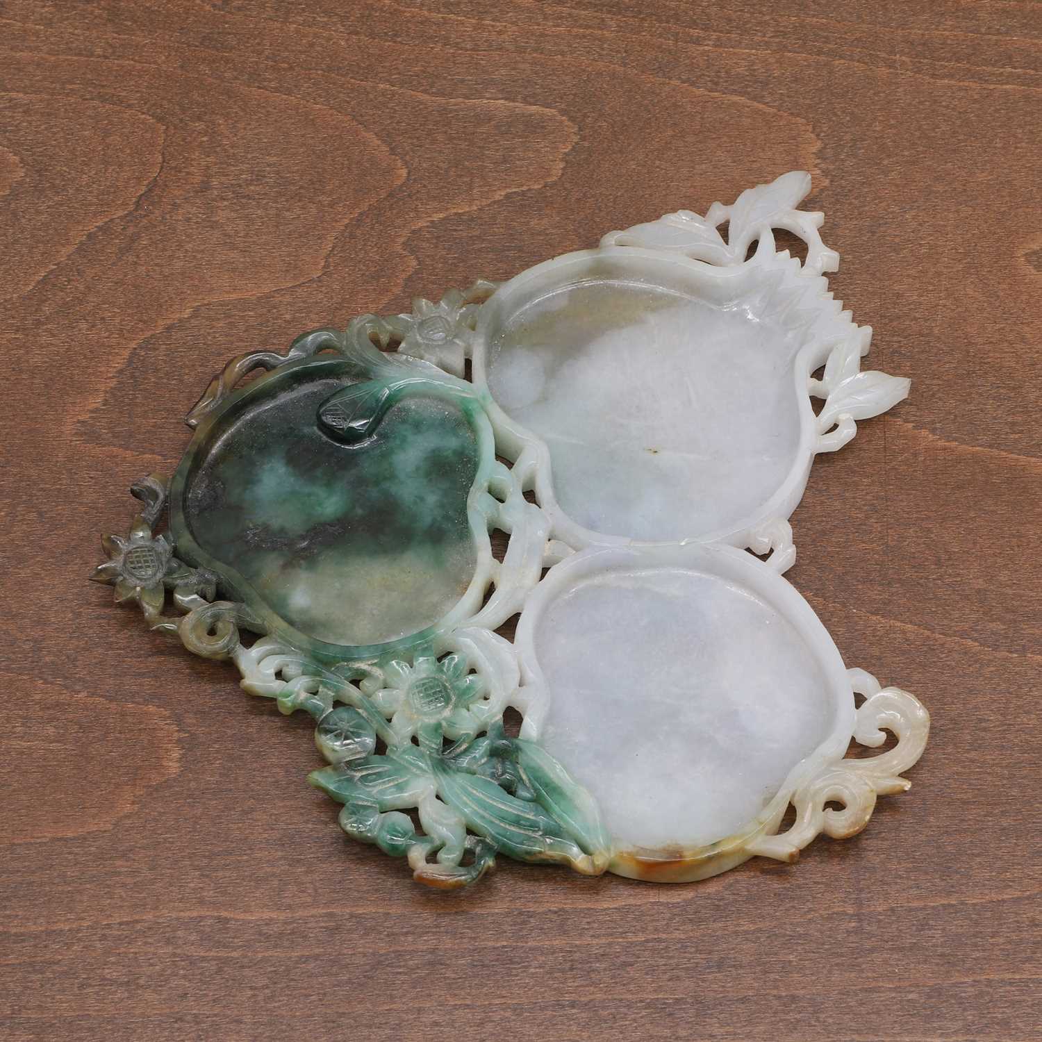 A Chinese jadeite 'sanduo' dish,