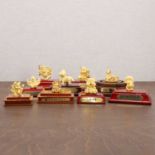 A collection of nine Chinese 18ct gold figures,