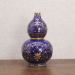 A Chinese blue-glazed double gourd vase,