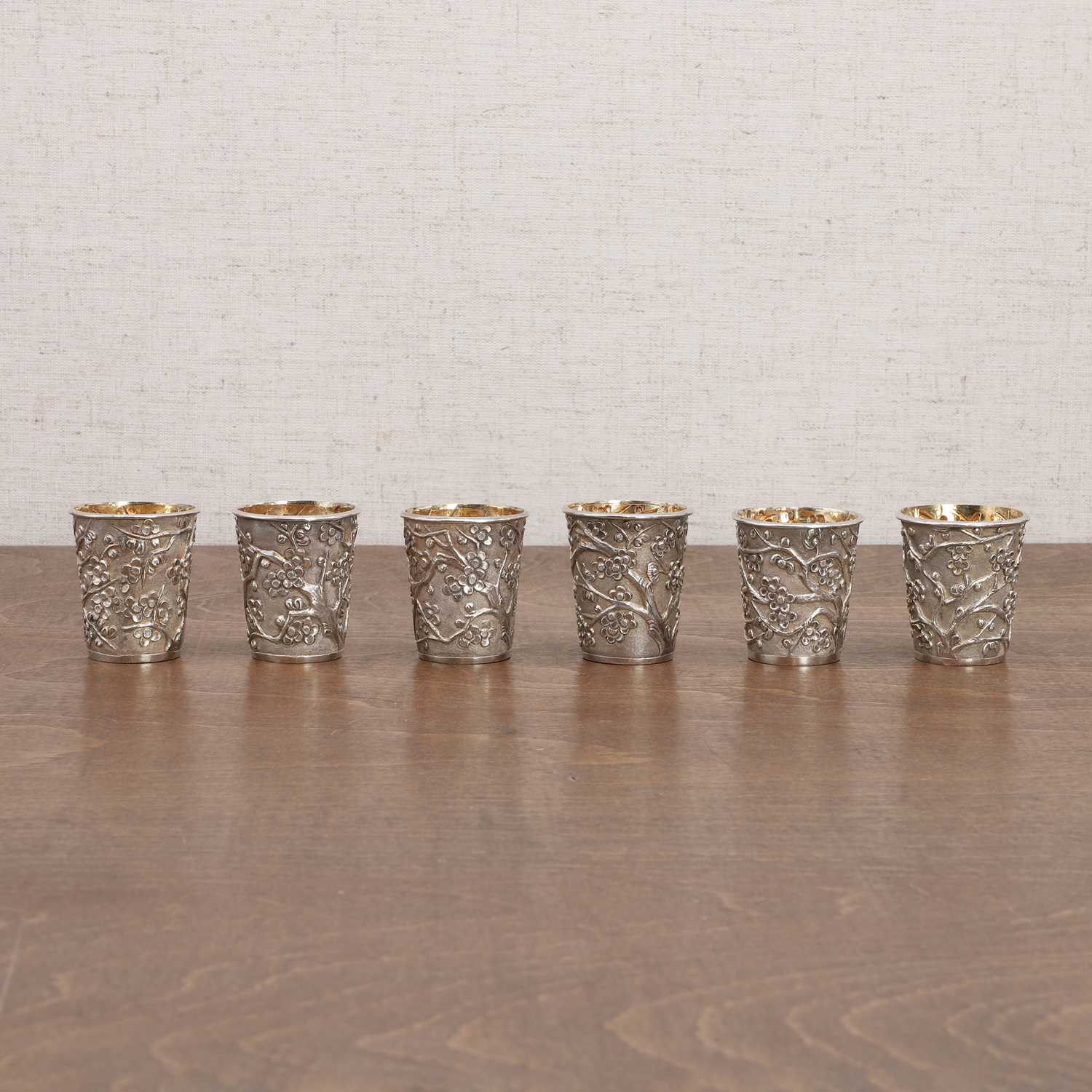 A group of Chinese silver beakers,