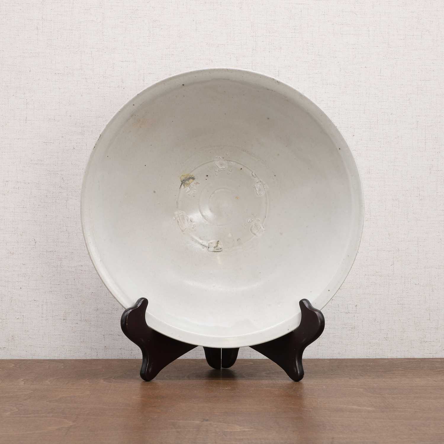 A Chinese white-glazed bowl,