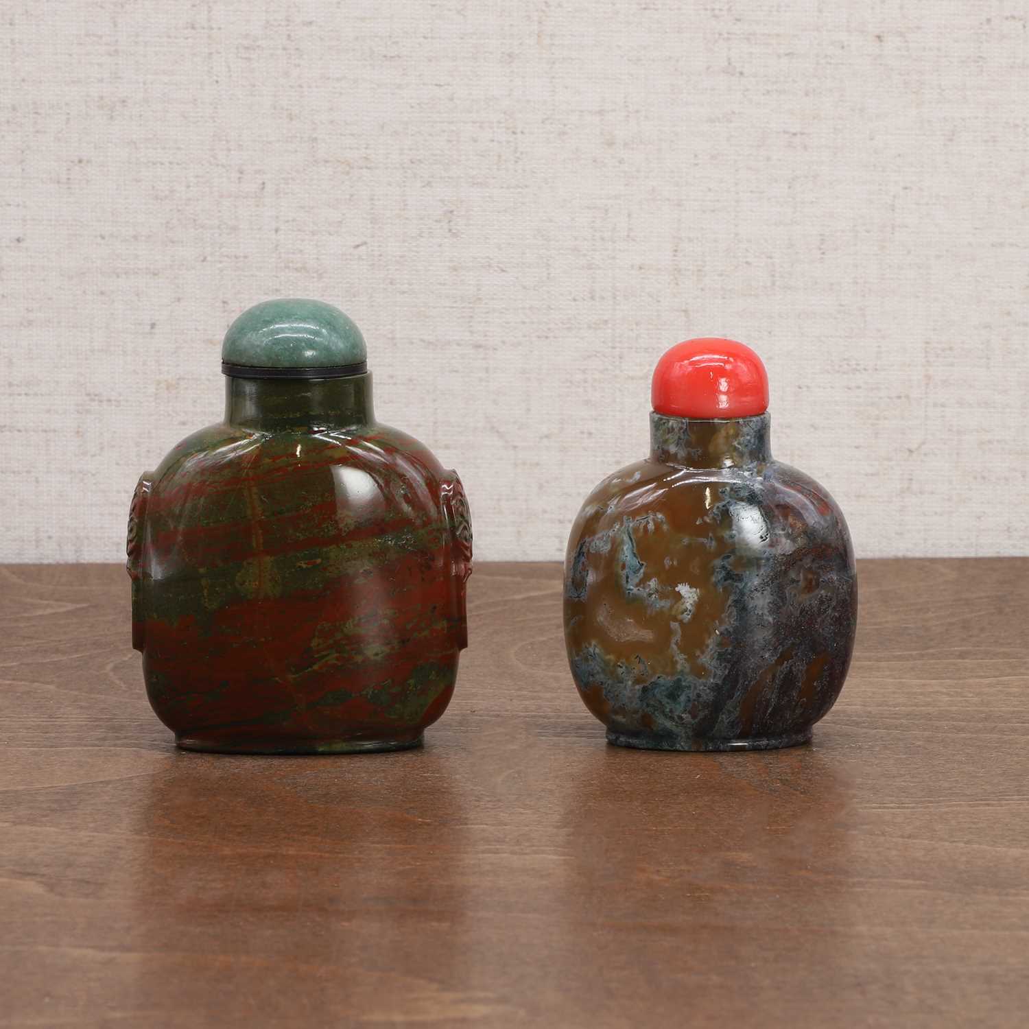 Two Chinese jasper snuff bottles,