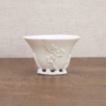A Chinese blanc de Chine libation cup,