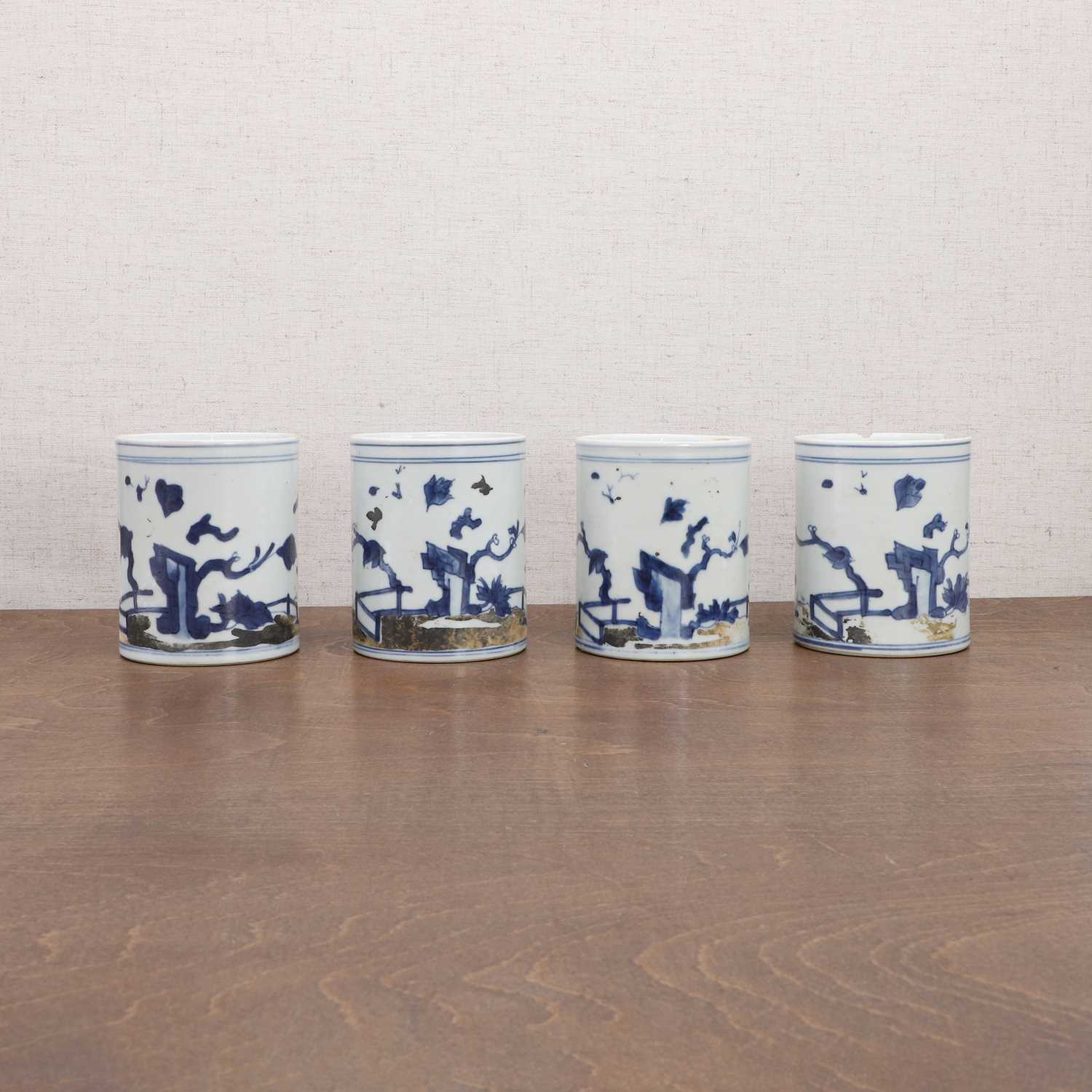 A collection of four Chinese Nanking cargo blue and white mugs,