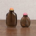 Two Chinese smoky quartz snuff bottles,