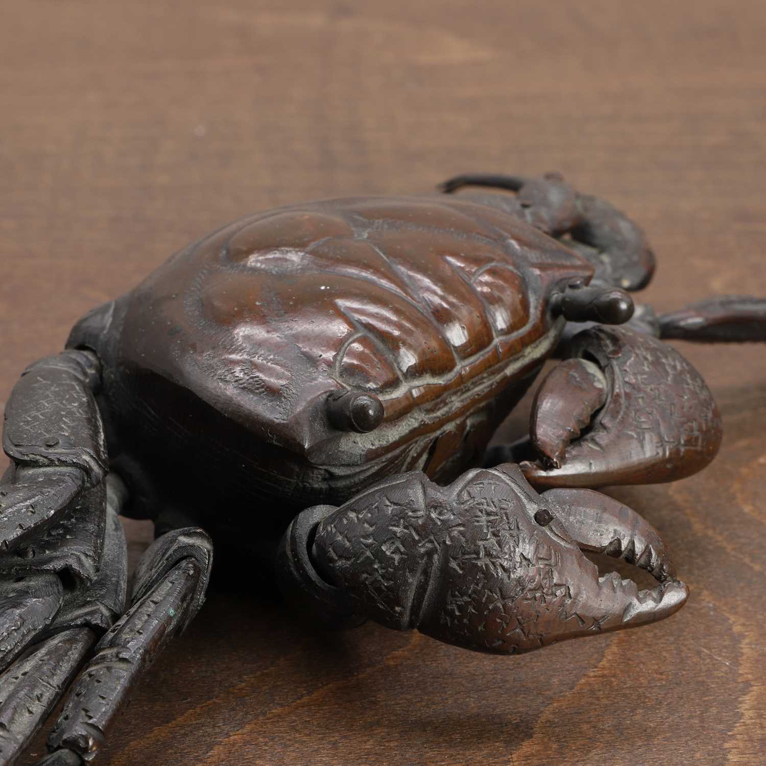 A Japanese bronze jizai okimono,
