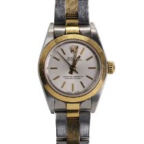 A ladies' 18ct gold and stainless steel Rolex Oyster Perpetual bracelet watch,
