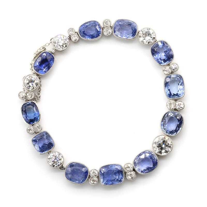 A Ceylon sapphire and diamond rivière bracelet, c.1920,