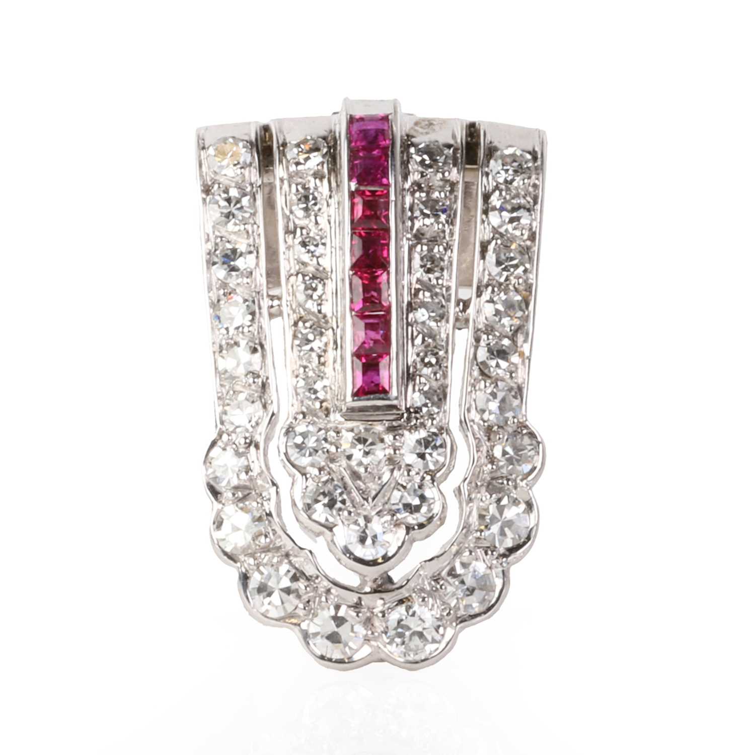 A diamond and ruby clip brooch, c.1940,