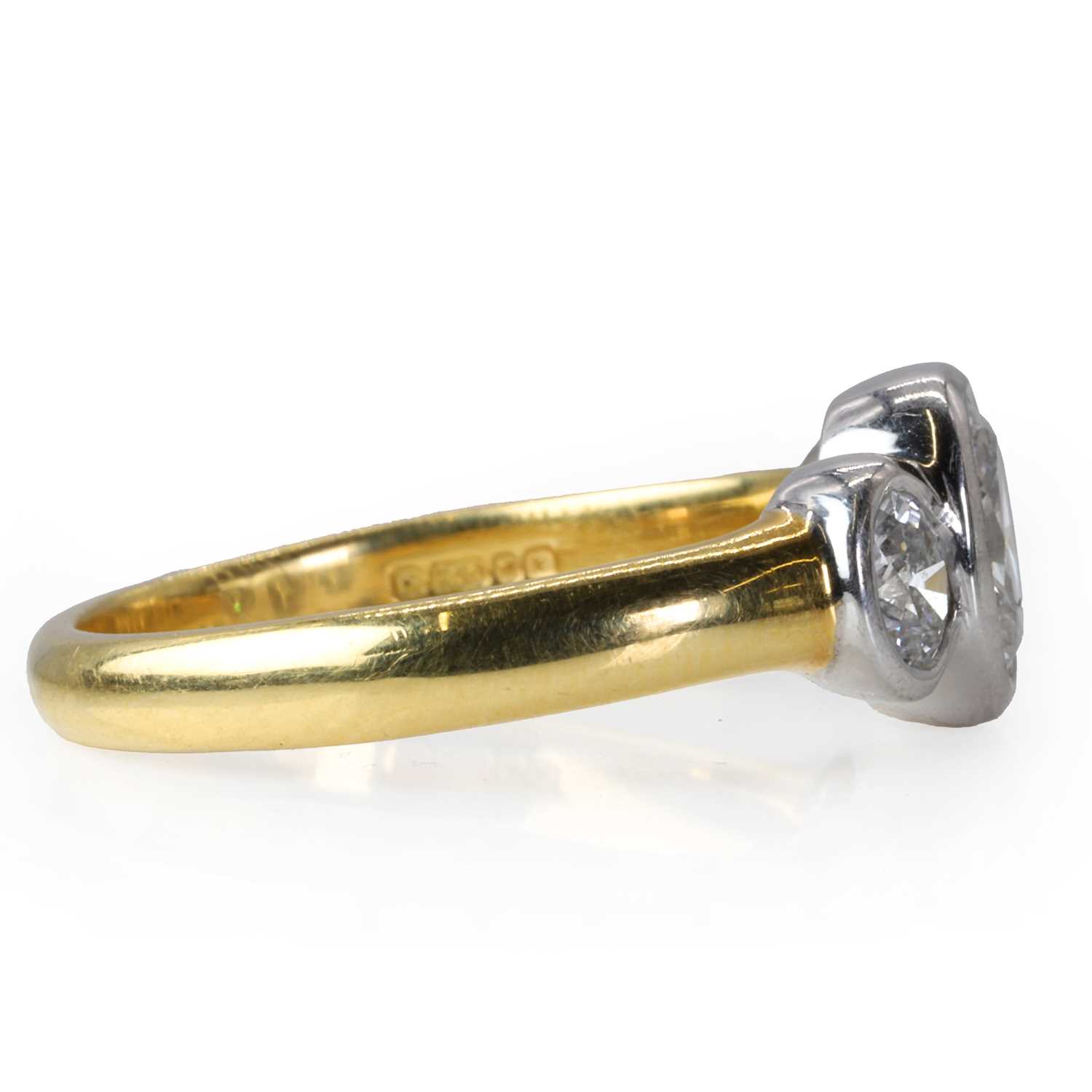 An 18ct gold and oval cut diamond three stone ring, - Image 3 of 3