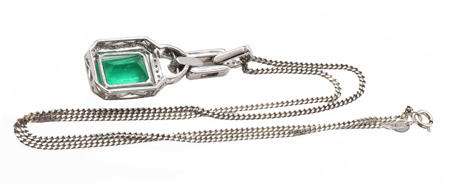 An 18ct white gold Colombian emerald and diamond pendant and chain, - Image 2 of 4
