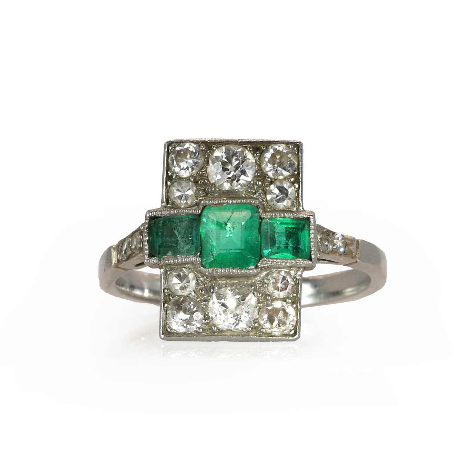 An emerald and diamond panel ring, c.1915,