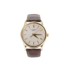 A gentlemen’s 18ct gold Patek Philippe Calatrava automatic strap watch,