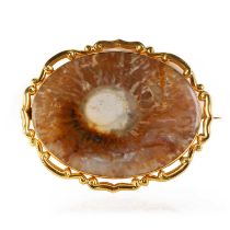 A Victorian gold mounted hardstone brooch,