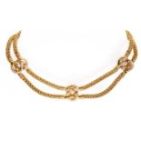 An 18ct gold and diamond necklace, by Asprey,