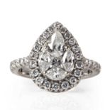 A white gold and diamond pear shaped cluster ring,