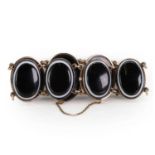 A gold mounted bullseye agate bracelet, late 19th century,