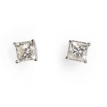 A pair of princess cut diamond stud earrings,
