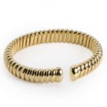 An 18ct gold torque bangle, by Mappin & Webb,