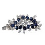 A white gold sapphire and diamond clip brooch,