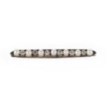 A pearl and diamond bar brooch,