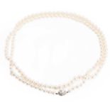 A single row uniform cultured pearl necklace, with a Mikimoto certificate,