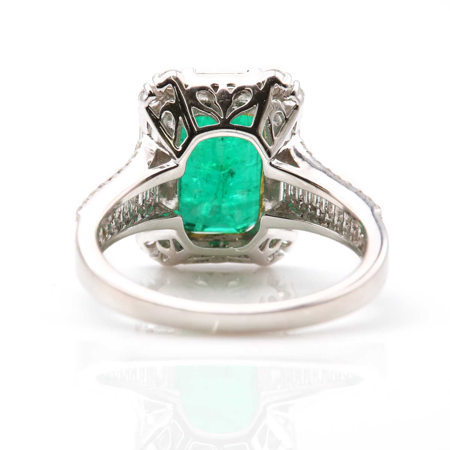 A white gold emerald and diamond cluster ring, - Image 3 of 8