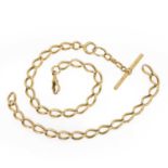 An 18ct gold Albert chain,