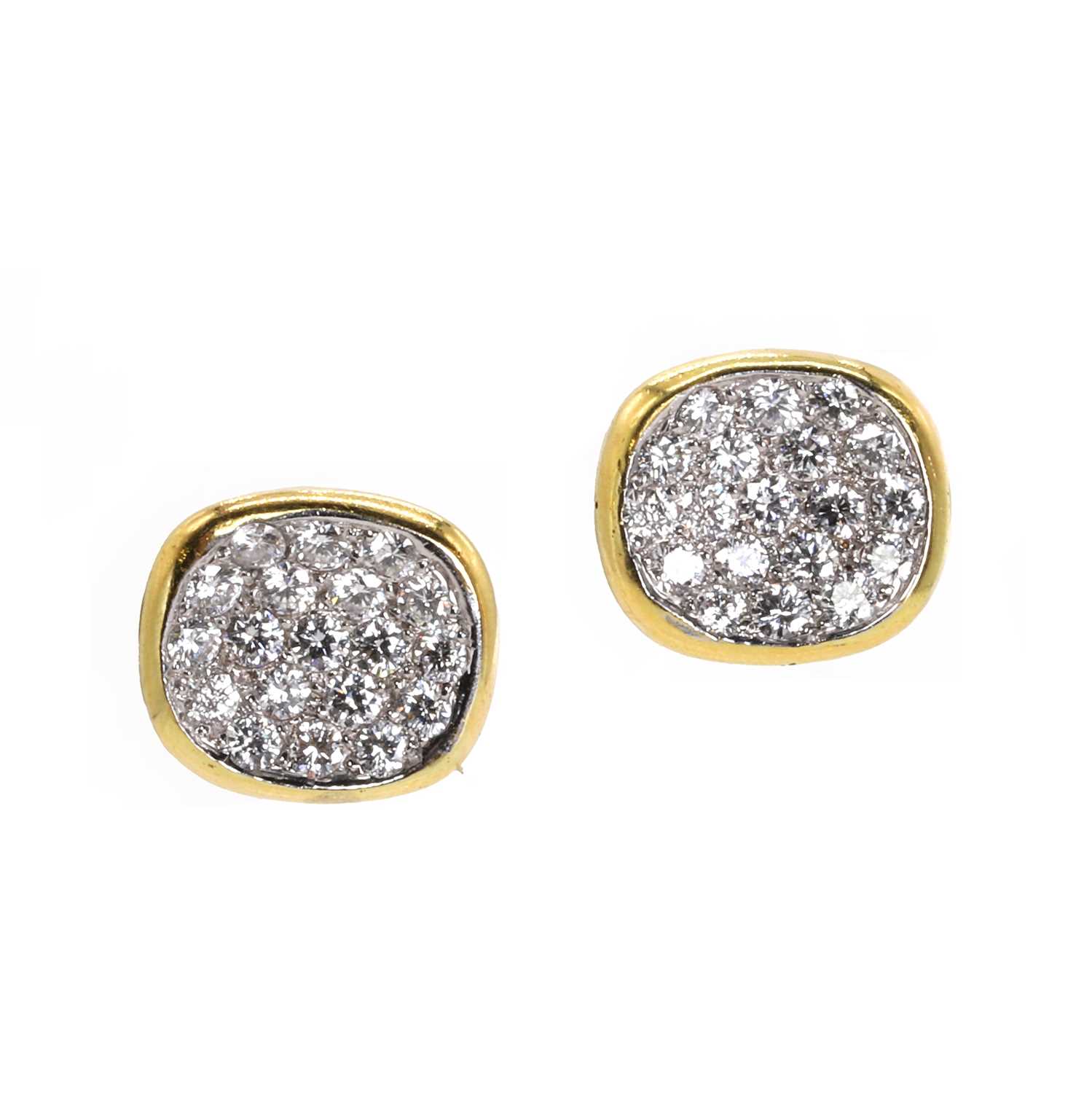 A pair of pavé diamond stud earrings,