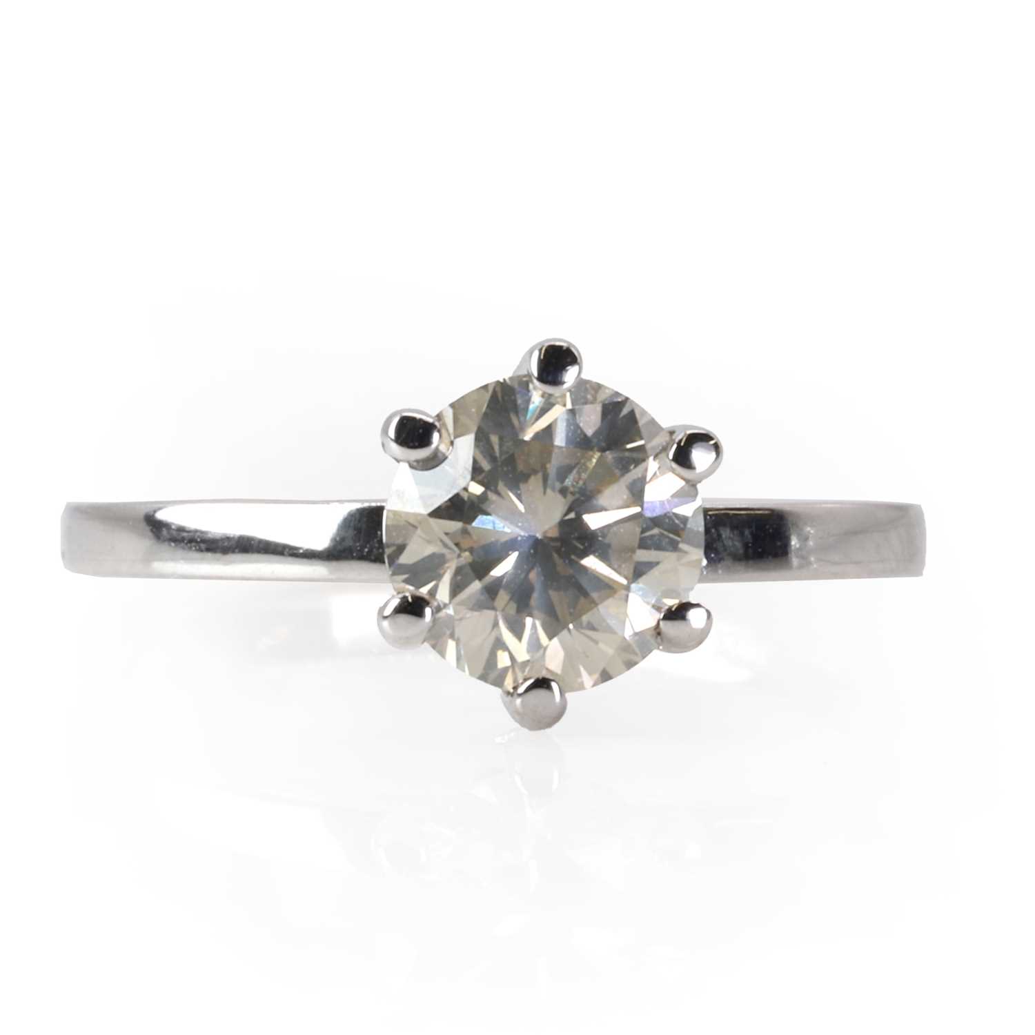 A white gold single stone diamond ring,