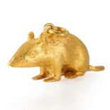 A gold rat charm,