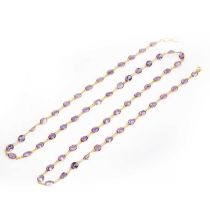 A gold amethyst necklace,